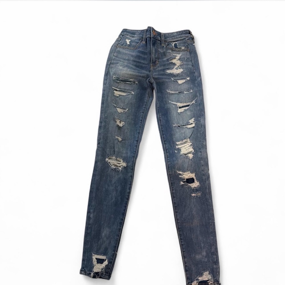 American Eagle Outfitters Distressed Blue Skinny Jeggings
new~ size 4 Longs